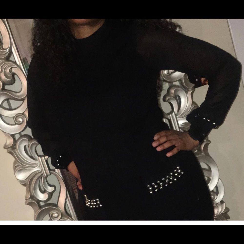 Light sweater with sheer sleeves and silver studs